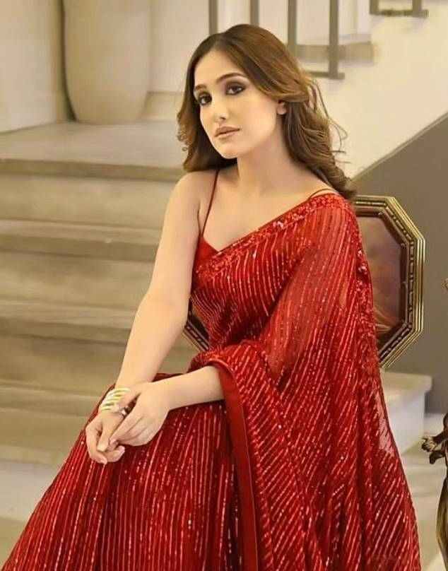 Aiza Awan in red saree