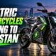 Electric motorcycles parked outside a bike showroom in Pakistan