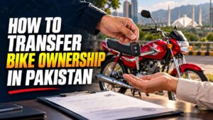 Buyer and seller completing papers to transfer bike ownership in Pakistan